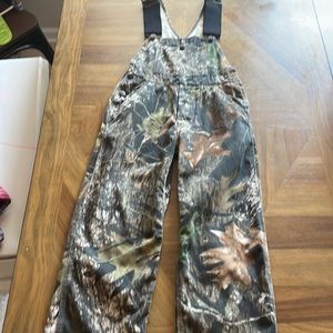 Youth small camo coveralls.
